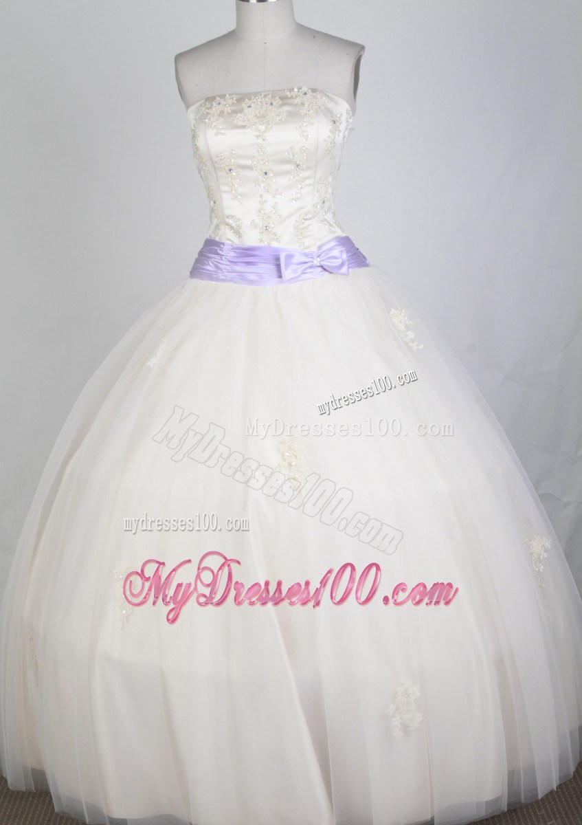Cream Colored Tulle Quinceanera Dress with Lilac Bowknot Sash
